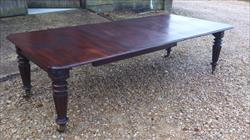 mahogany antique extending dining table.jpg